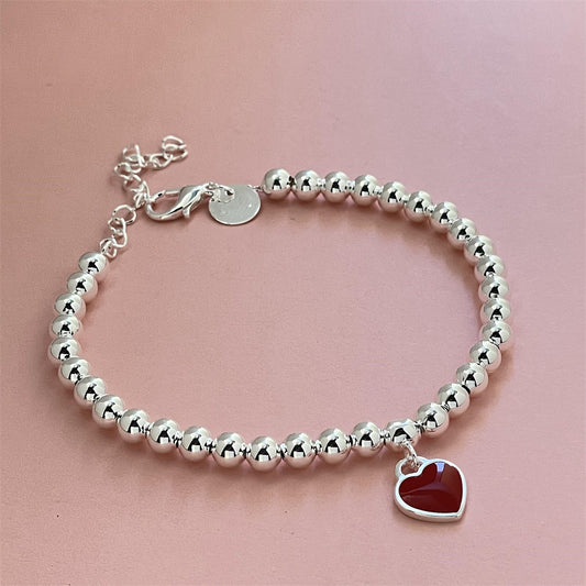 Bracciale con cuore rosso