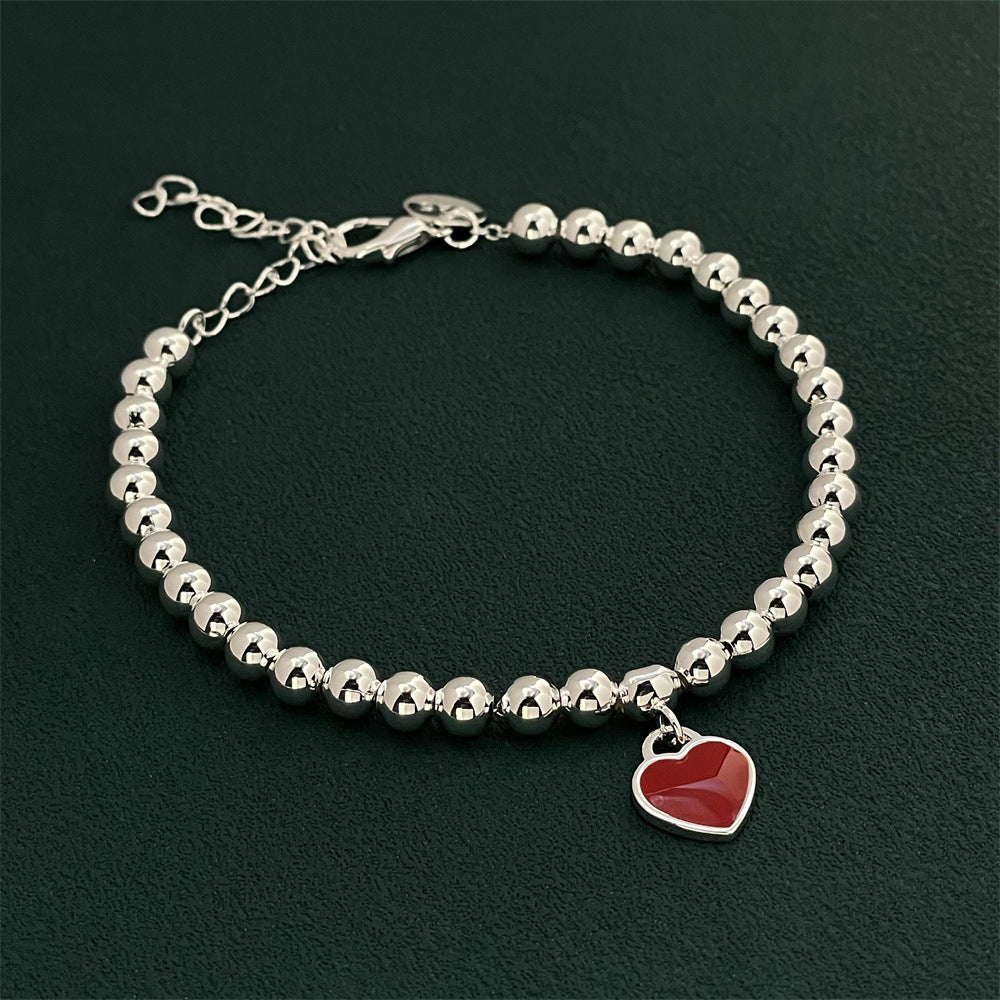 Bracciale con cuore rosso