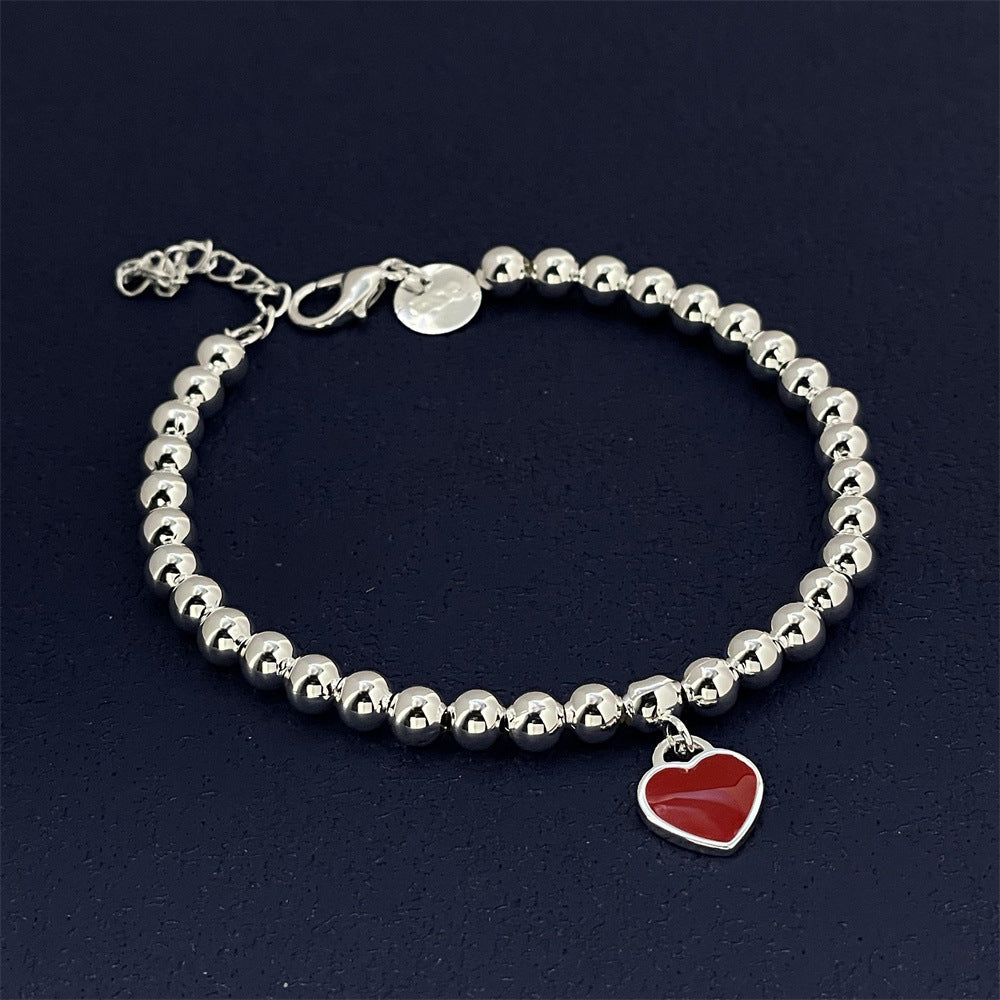 Bracciale con cuore rosso